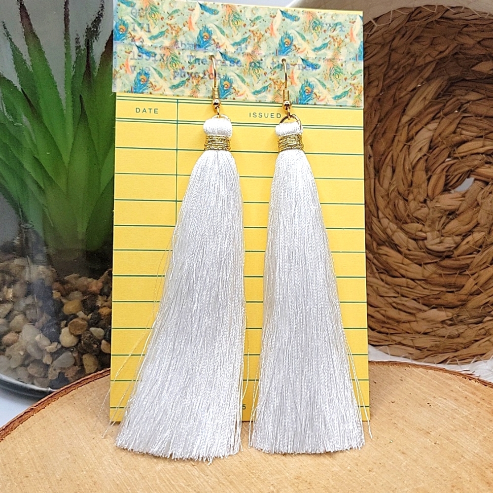 2/$10 large white tassle earrings